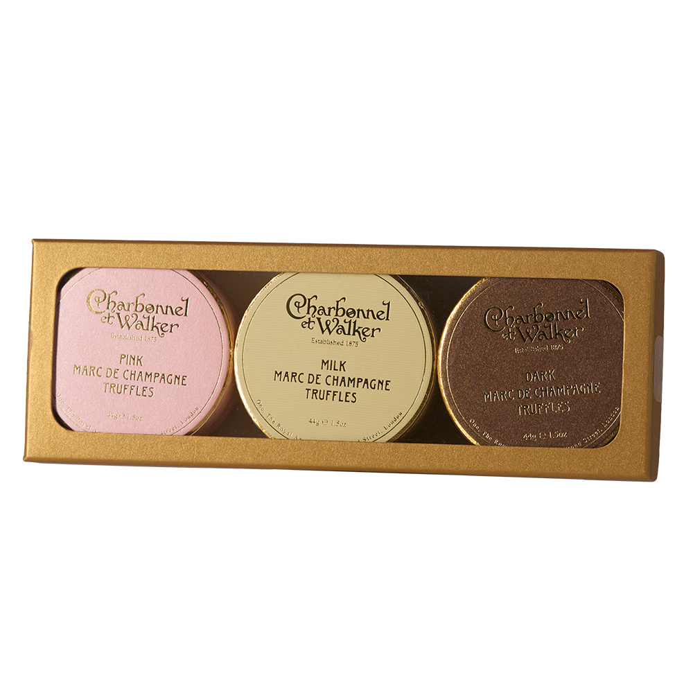 Half bottle of Ruinart Rosé and trio of Charbonel & Walker champagne truffles in a wooden gift box