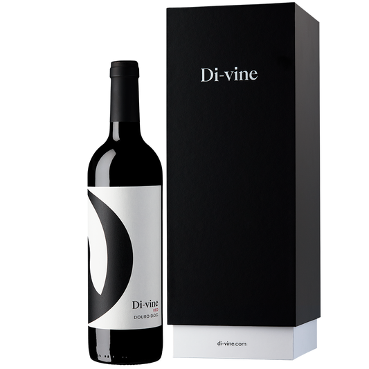 Front view of a bottle of “Di-vine” red wine 75cl and a black and white gift box with “Di-vine” printed on the front, all on a white background. 