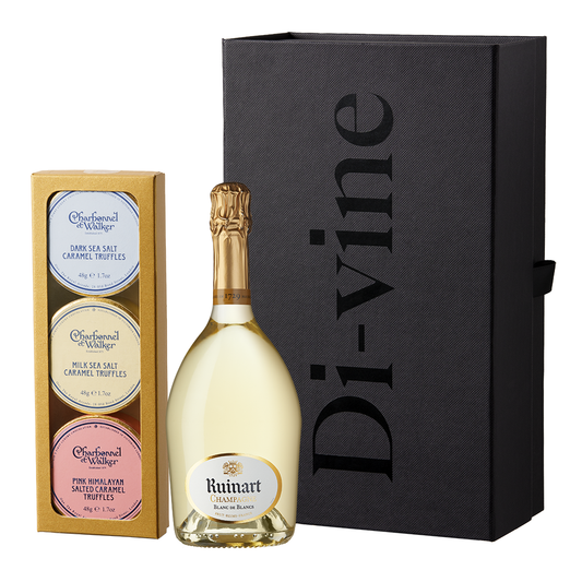 Half bottle of Ruinart Blanc de Blancs and trio of Charbonel & Walker champagne truffles in a small black hamper gift box