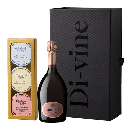 Half bottle of Ruinart Rosé and trio of Charbonel & Walker champagne truffles in a small black hamper gift box