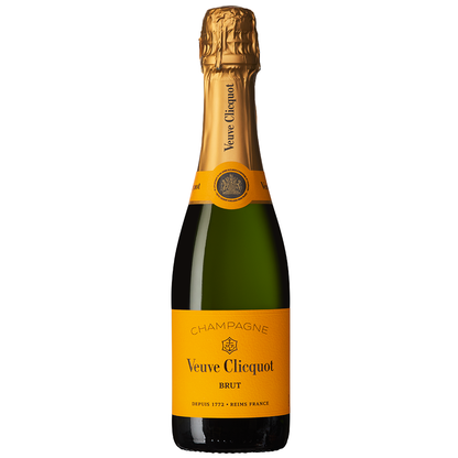 Half bottle of Veuve Clicquot Yellow Label and trio of Charbonel & Walker champagne truffles in a small black hamper gift box