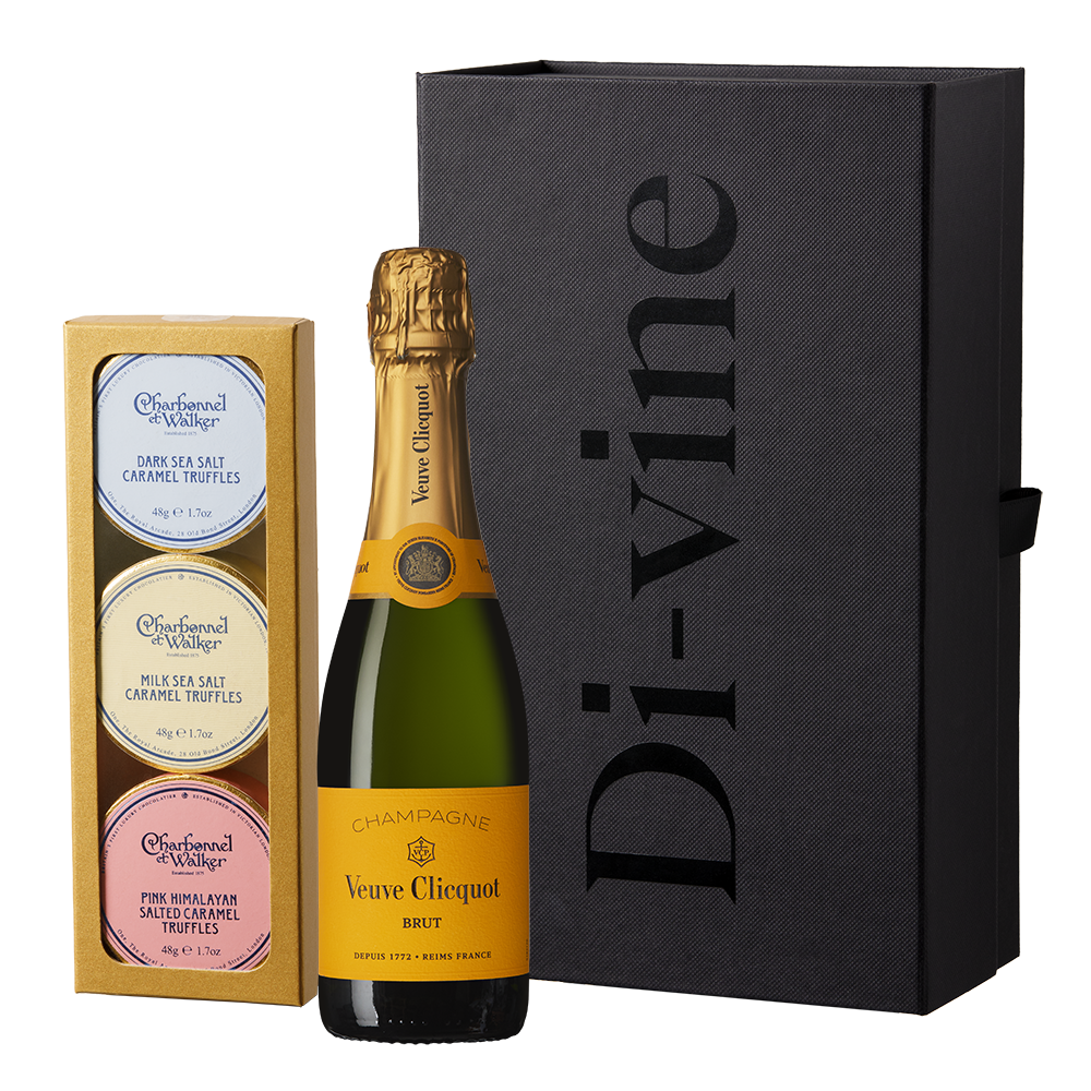 Half bottle of Veuve Clicquot Yellow Label and trio of Charbonel & Walker champagne truffles in a small black hamper gift box
