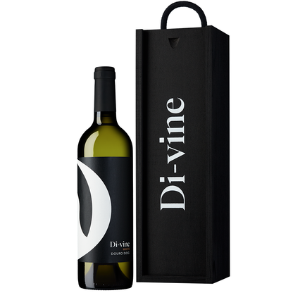 Front view of a bottle of “Di-vine” white wine 75cl and a black wooden gift box with “Di-vine” printed on the front in white, all on a white background. 